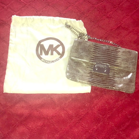 Michael Kors Handbags - Authentic Michael Kors Clutch